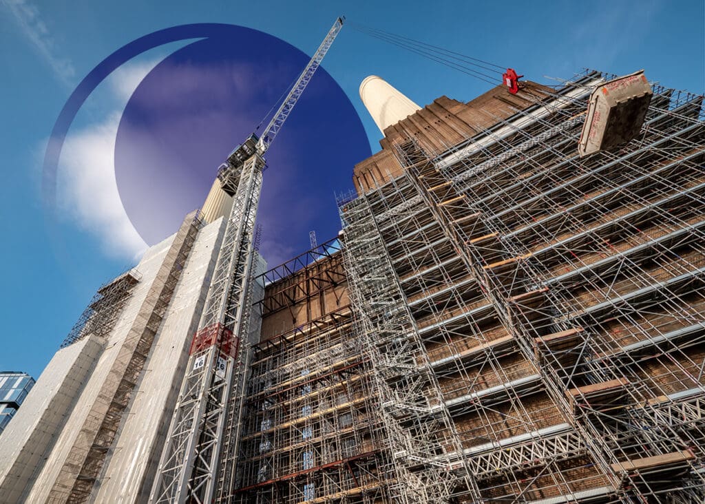 LONDON, UK - 31 OCTOBER 2018: A low angle view of the scaffolding, cranes and construction works being carried out on the redevelopment of the iconic Battersea Power Station building in South West London.