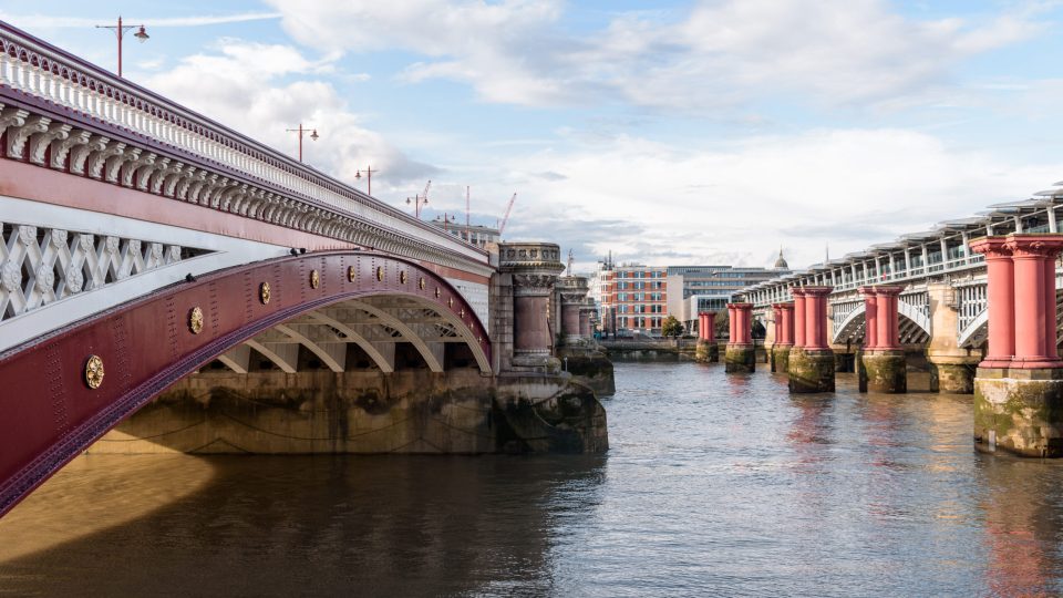 Cityscape of London by Thames River. Blackfriars Bridge