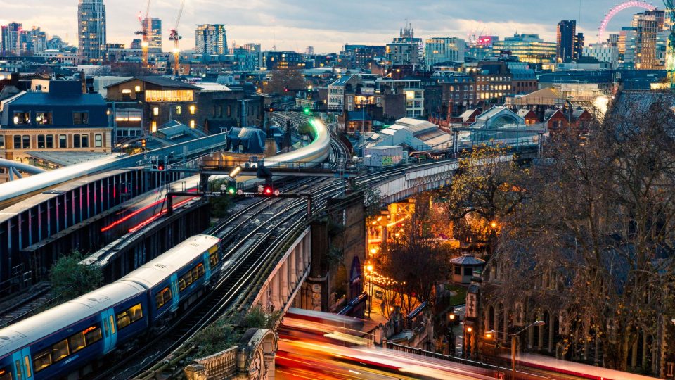 A high angle shot of modern buildings at dark night in London, England