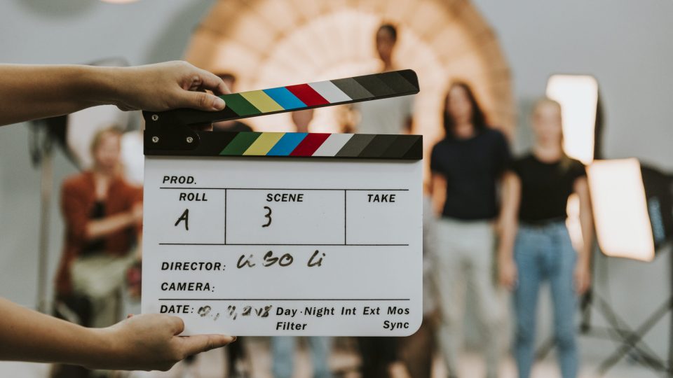 woman-holding-a-movie-production-clapperboard-2025-02-10-13-55-10-utc